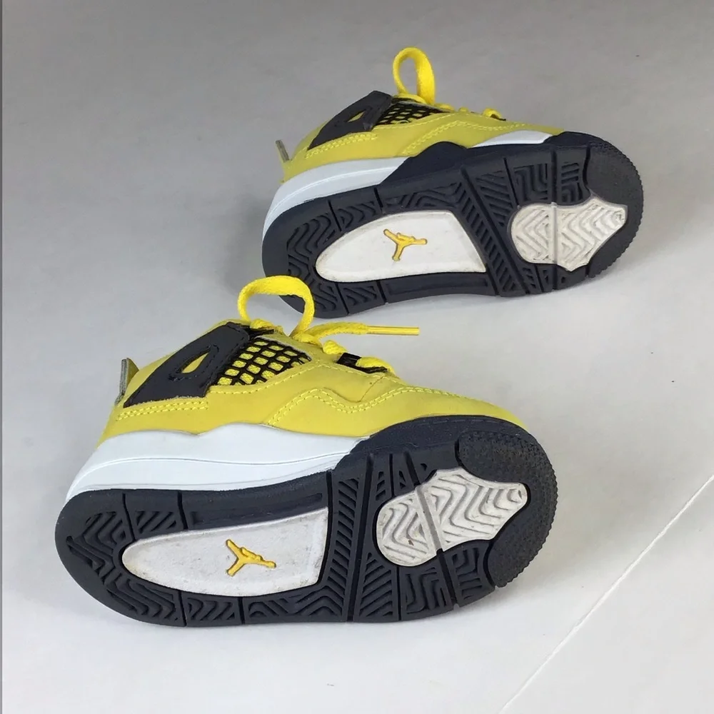 Nike Air Jordan 4 Retro TD Lightning Sneaker in Yellow Size 5.
